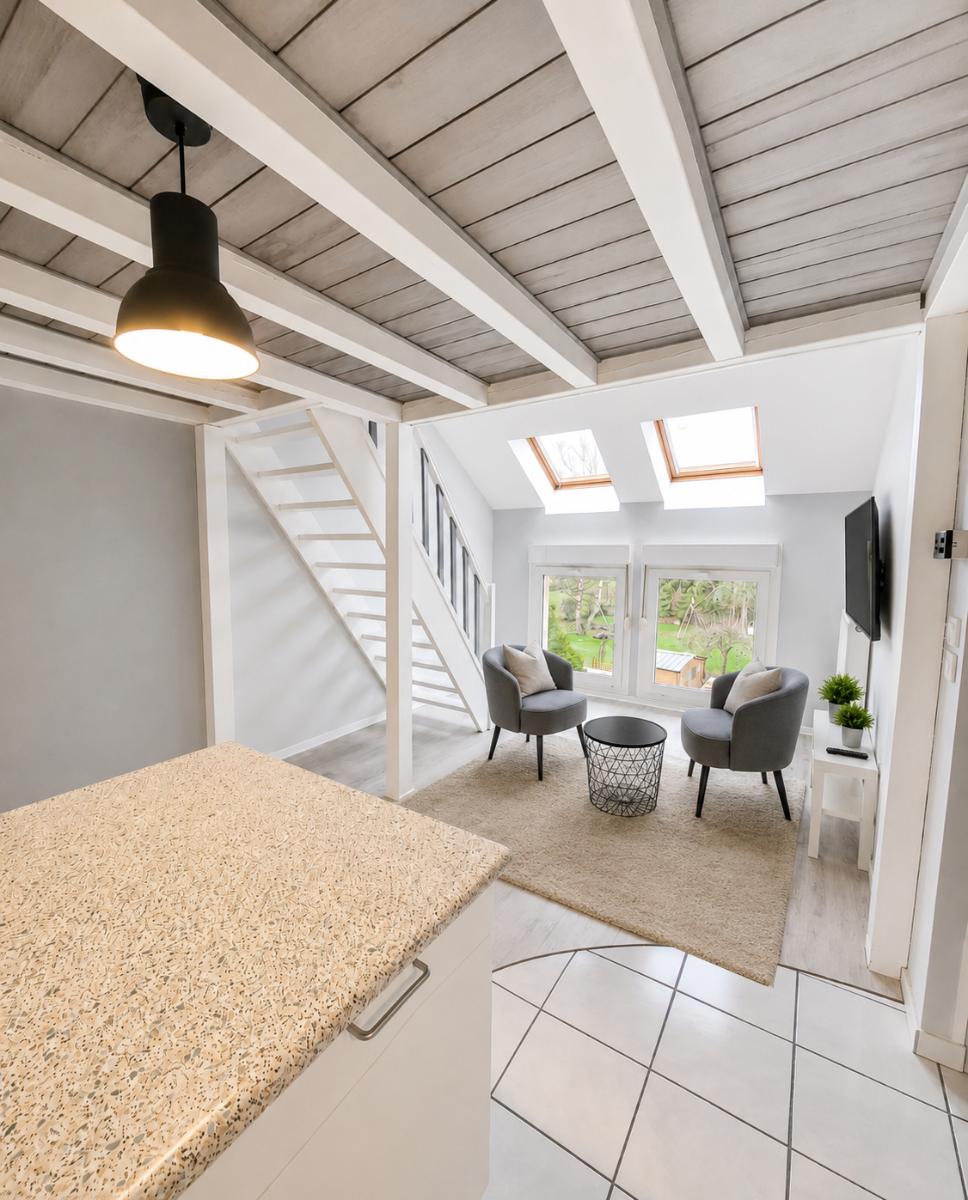 Séjour lumineux de la location studio meublé à Saint-Avold